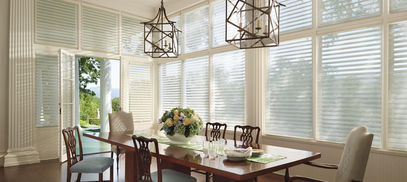 Dining Room Table showing blinds on the windows